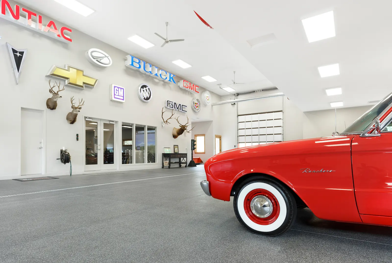 Classic car in the finished collector garage, Glorified Garage, Refined Designs by Natalie