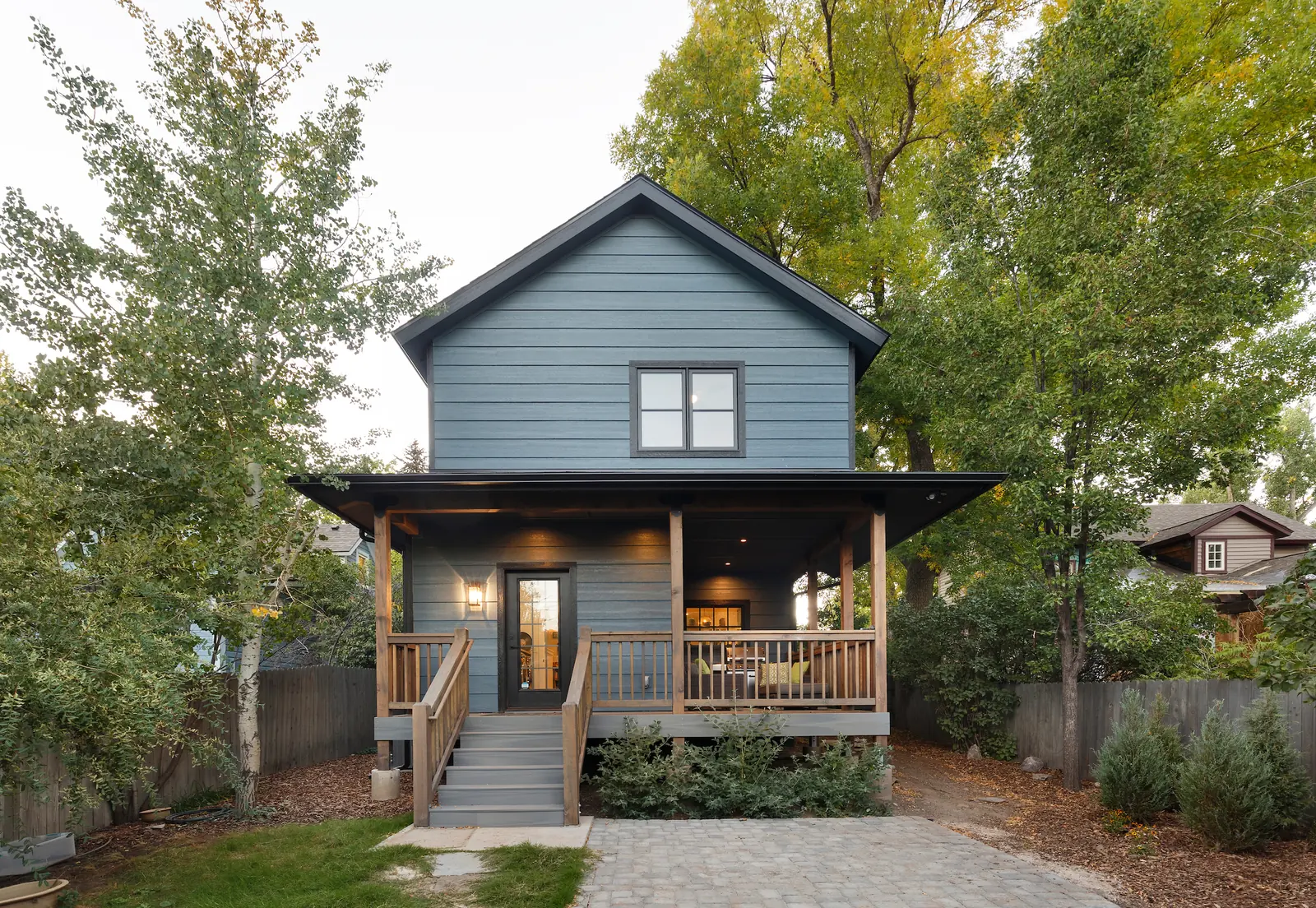 Front porch and preserved historic elevation, Historic Charm in a Small Town, Refined Designs by Natalie