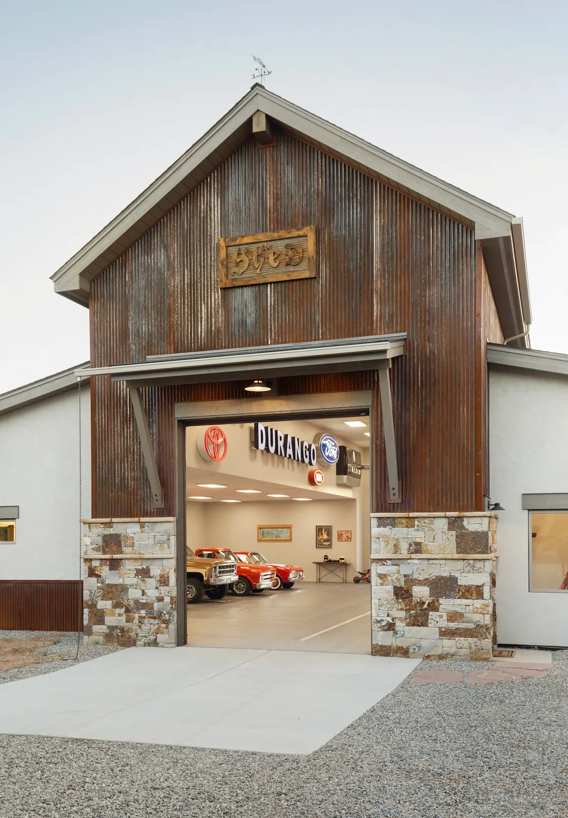 Garage entry with cars inside, Glorified Garage, Refined Designs by Natalie
