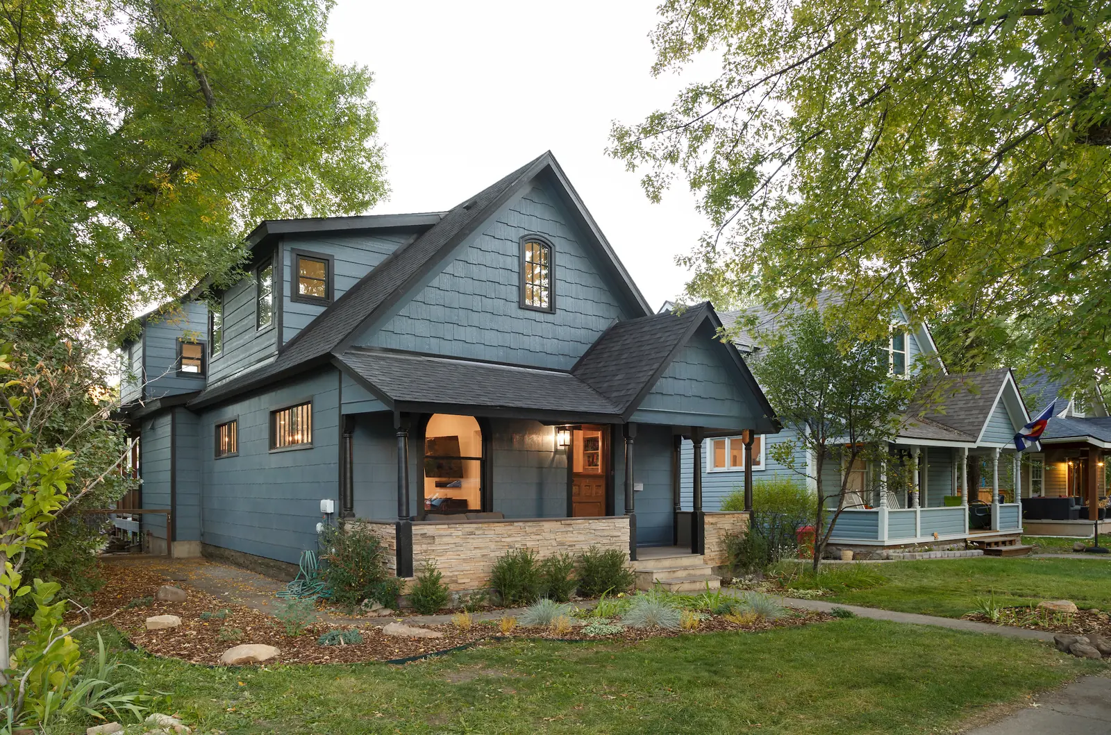Exterior of the historic home in the evening, Historic Charm in a Small Town, Refined Designs by Natalie