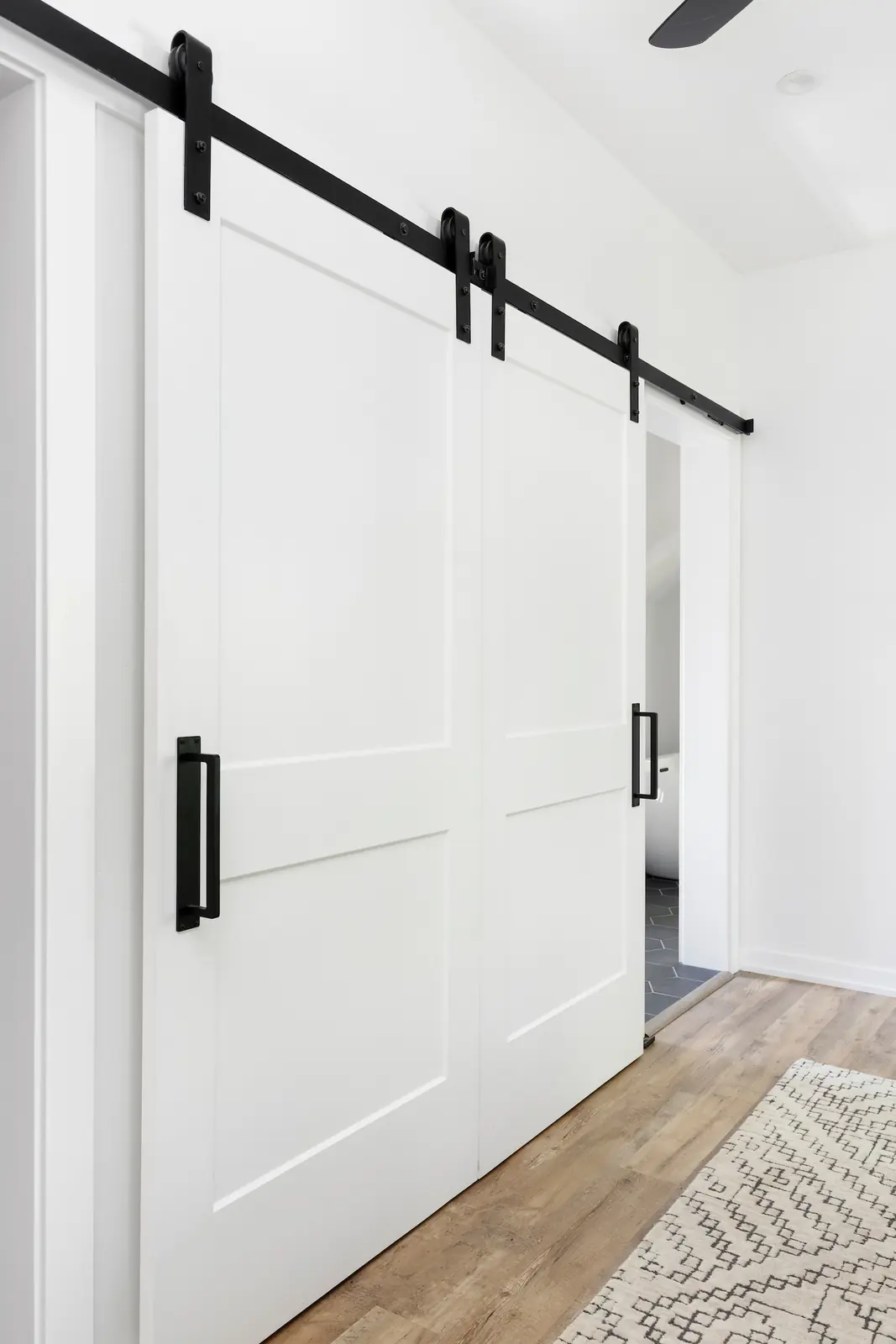 Sliding door in the upper level hallway, Historic Charm in a Small Town, Refined Designs by Natalie
