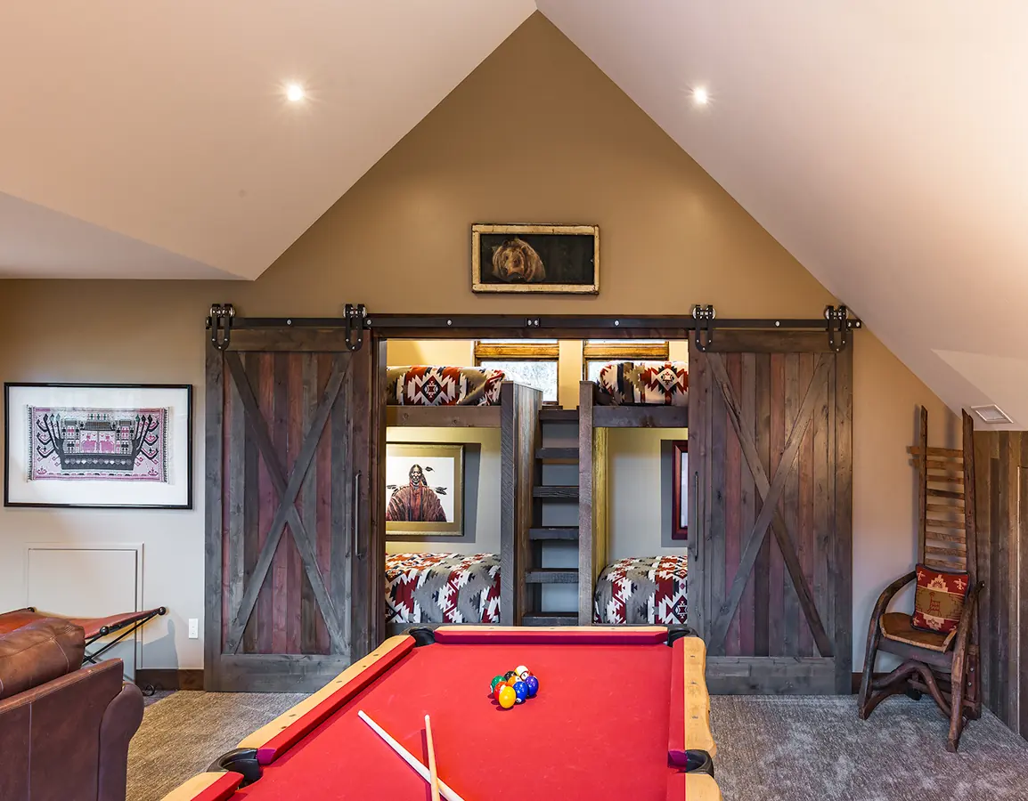 Bunk room with pool table and barn doors, Rustic Mountain Retreat, Refined Designs by Natalie