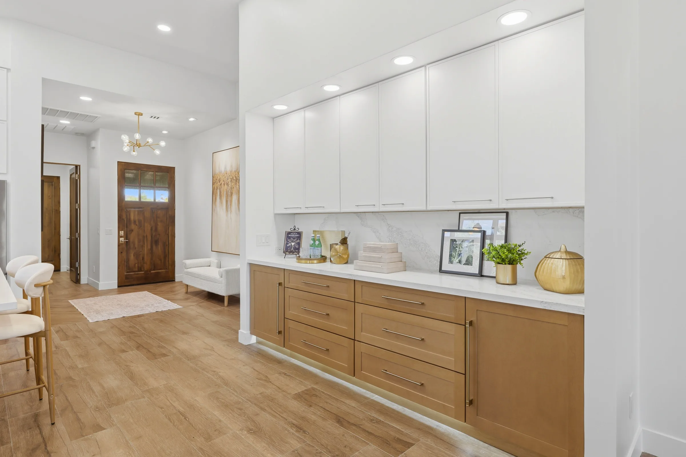Integrated wet bar with white oak cabinetry and satin brass hardware, The Modern Ranch Revival, Refined Designs by Natalie, Prescott, Arizona