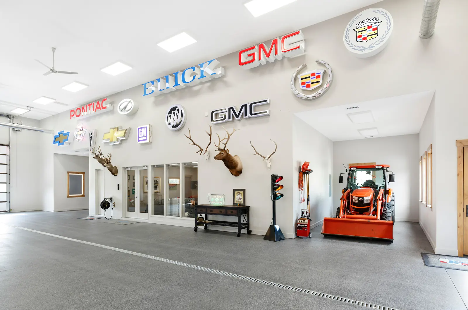 Garage interior with the owner's memorabilia displayed, Glorified Garage, Refined Designs by Natalie