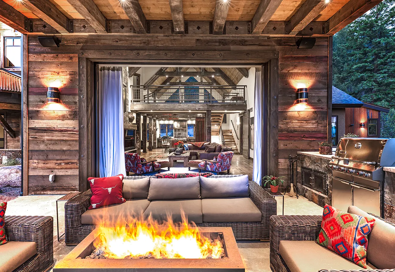 Outdoor living room with fireplace and grill, Rustic Mountain Retreat, Refined Designs by Natalie