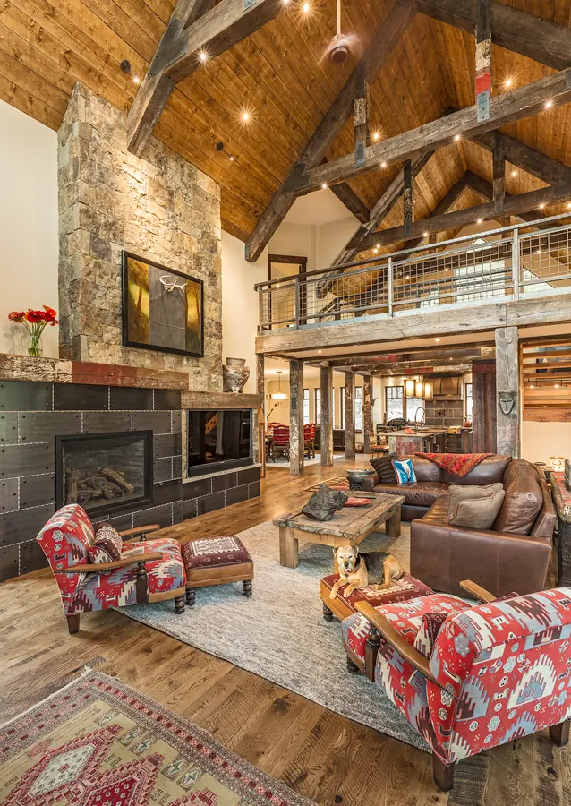 Great room with stone fireplace and timber trusses, Rustic Mountain Retreat, Refined Designs by Natalie, Durango, Colorado