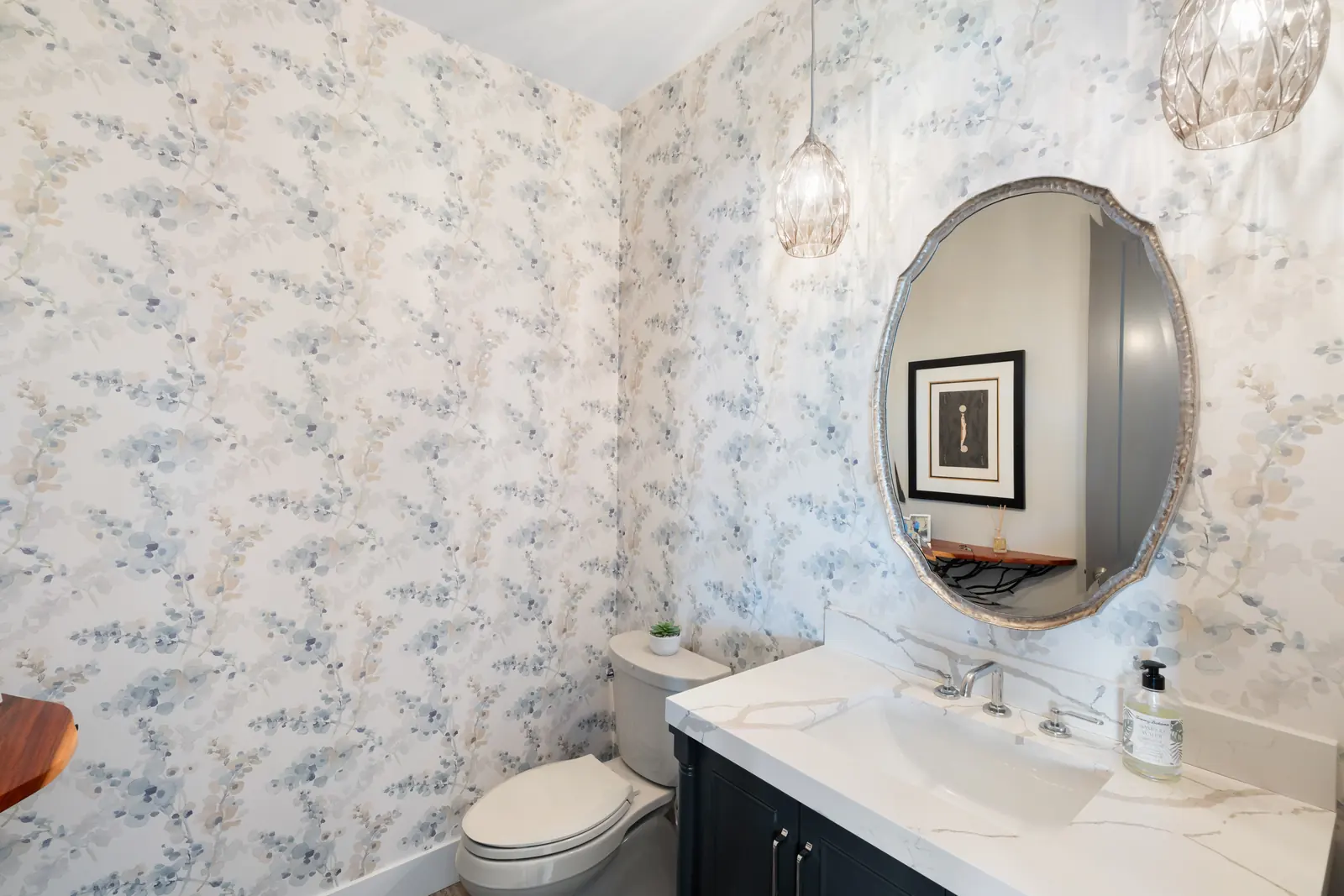 Powder room with wallpaper and a furniture-style vanity, Layers of Romance, Refined Designs by Natalie