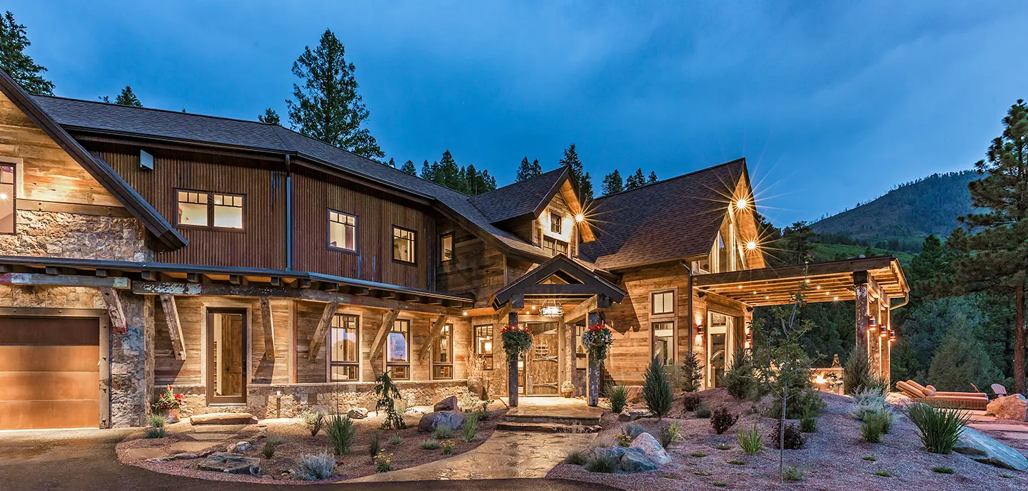 Exterior at dusk with timber entry, Rustic Mountain Retreat, Refined Designs by Natalie, Durango, Colorado