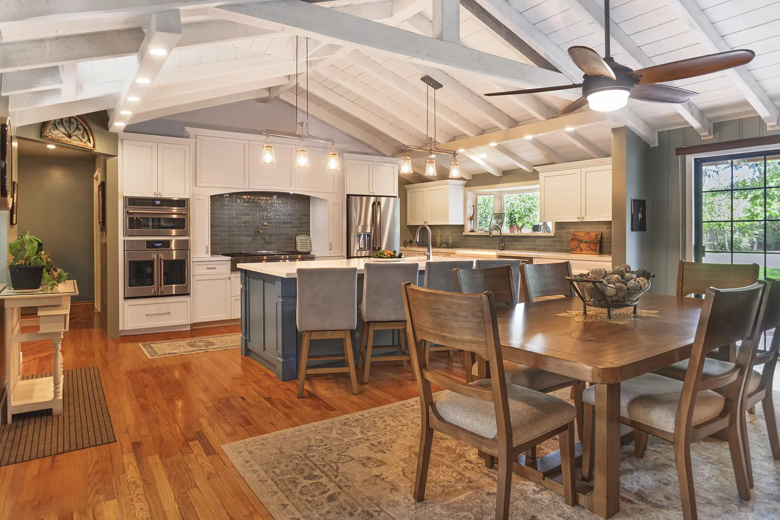Great room beneath the vaulted ceiling and exposed beams, The Heart of the Home, Refined Designs by Natalie