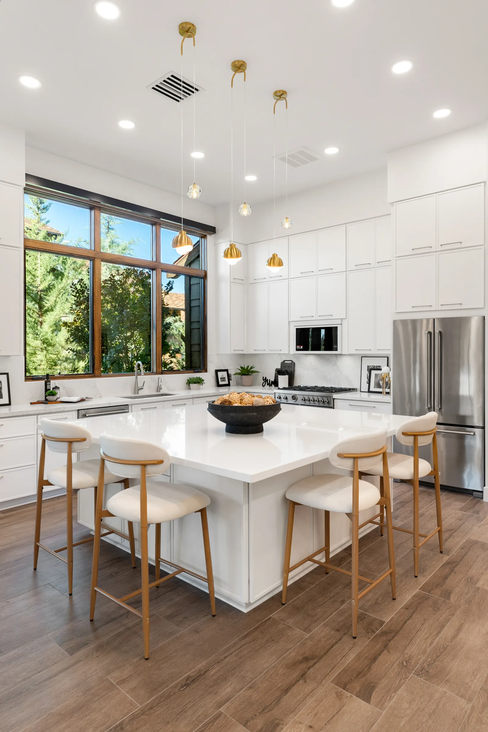 Kitchen cabinetry with layered lighting and glass and brass pendants, The Modern Ranch Revival, Refined Designs by Natalie, Prescott, Arizona