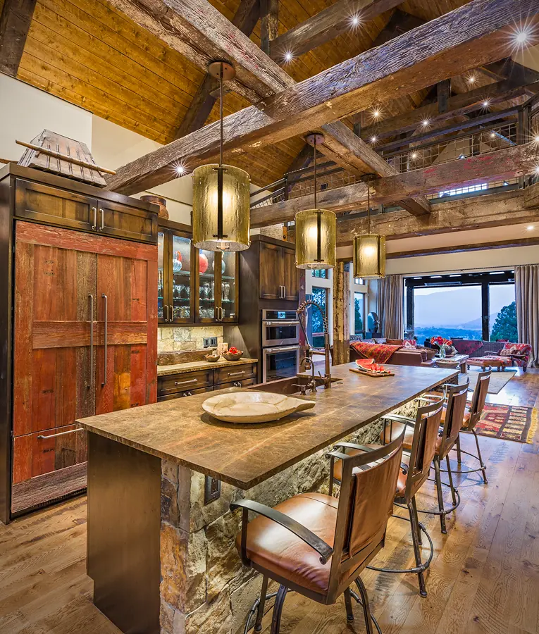 Kitchen island beneath heavy timber beams, Rustic Mountain Retreat, Refined Designs by Natalie