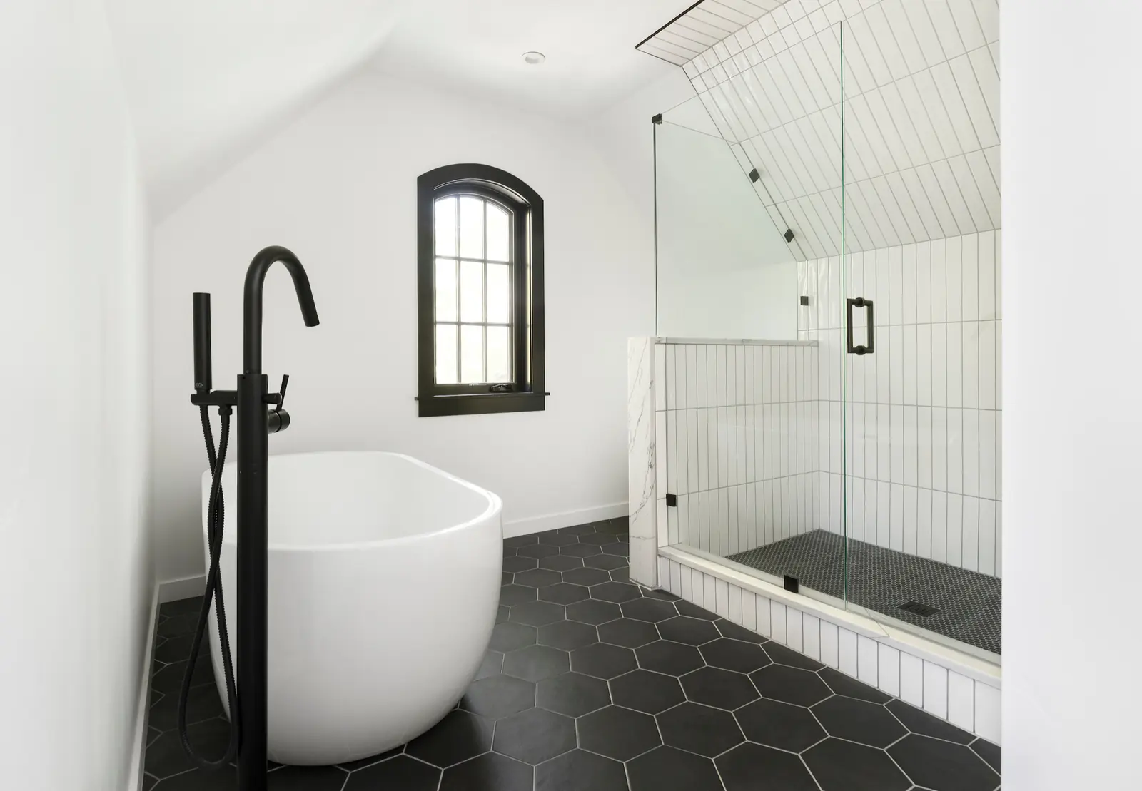 Freestanding tub and glass shower under the attic roofline, Historic Charm in a Small Town, Refined Designs by Natalie