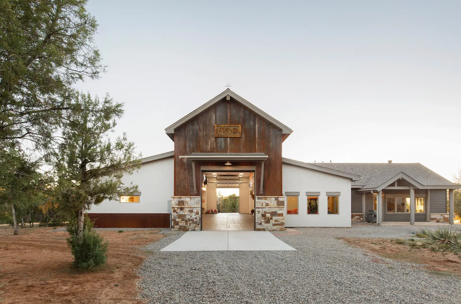 Barn-form addition beside the existing ranch home, Glorified Garage, Refined Designs by Natalie