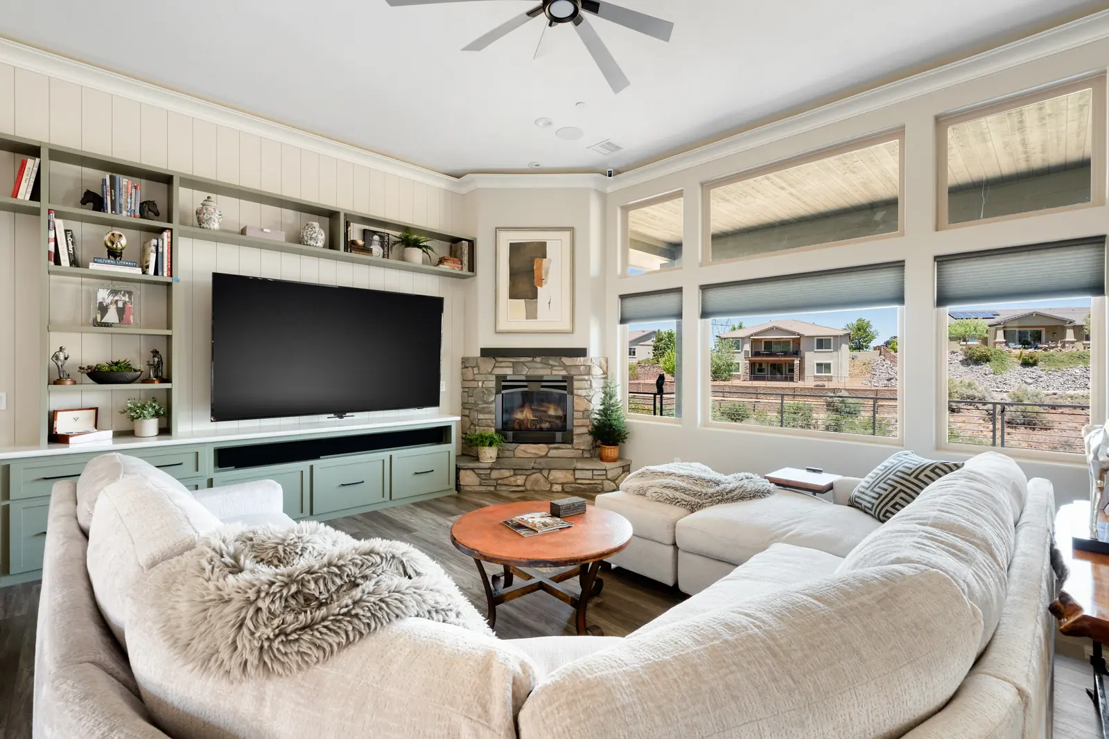 Living room with added millwork and layered lighting, Layers of Romance, Refined Designs by Natalie