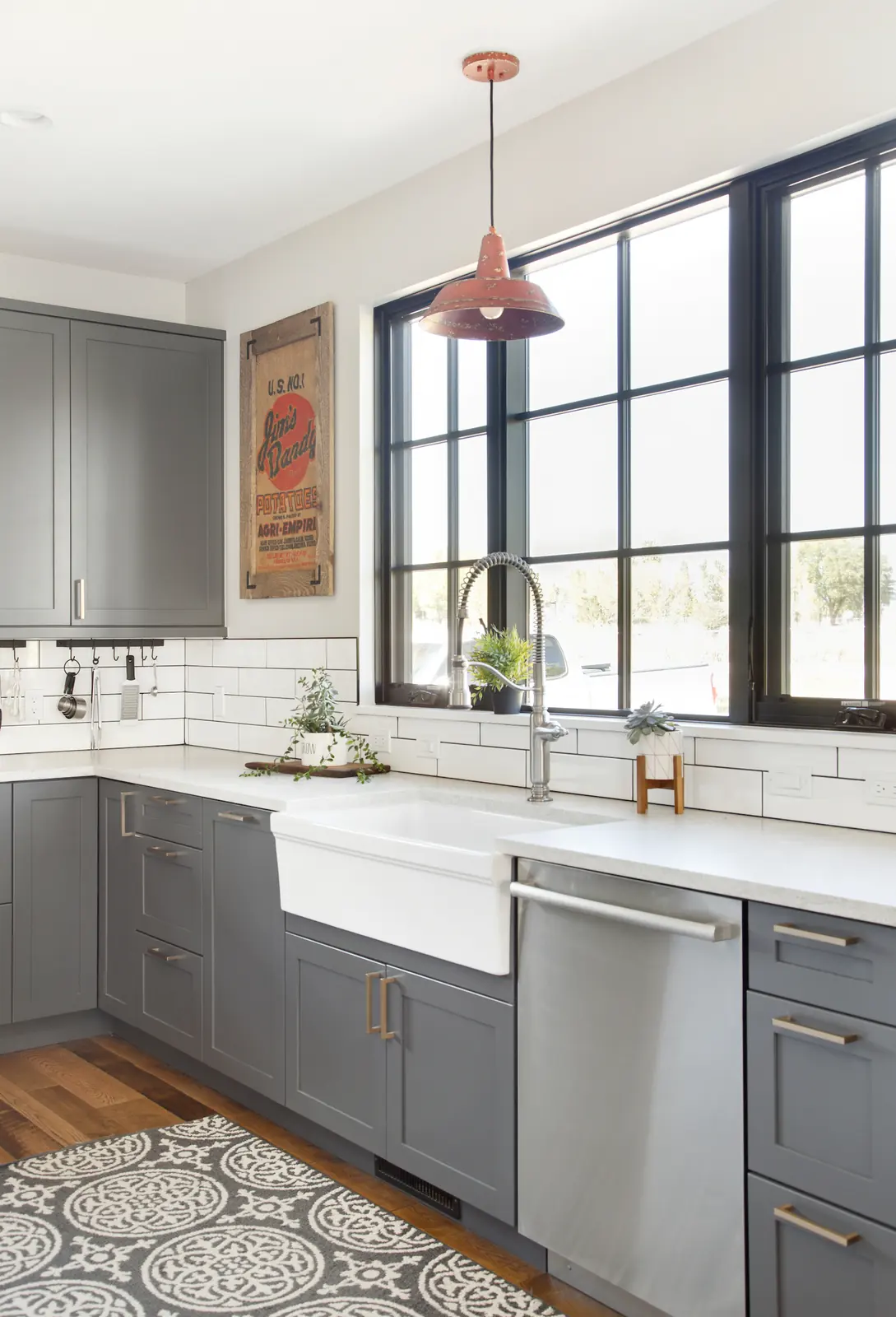 Farmhouse sink beneath black-framed windows, Bright and Airy Farmhouse, Refined Designs by Natalie