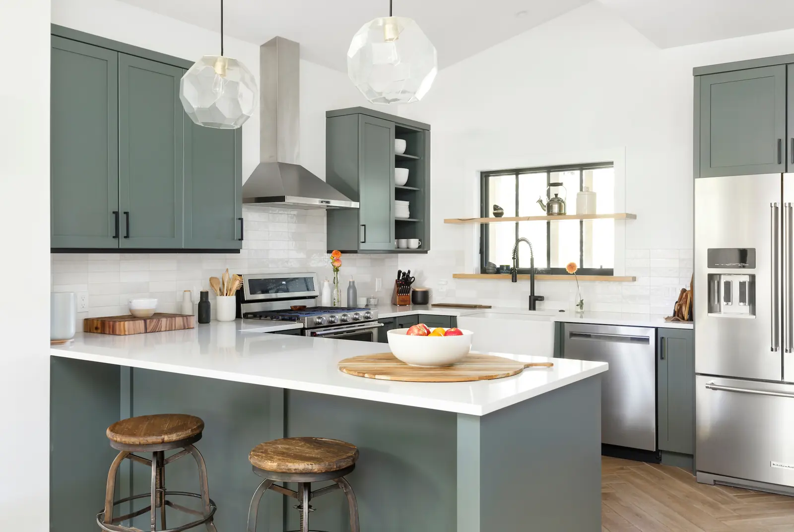 Island seating with floating shelves beyond, Historic Charm in a Small Town, Refined Designs by Natalie